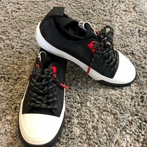 Bikkembergs two-tone, laces, round toeline, flat, fabric inner, rubber sole.